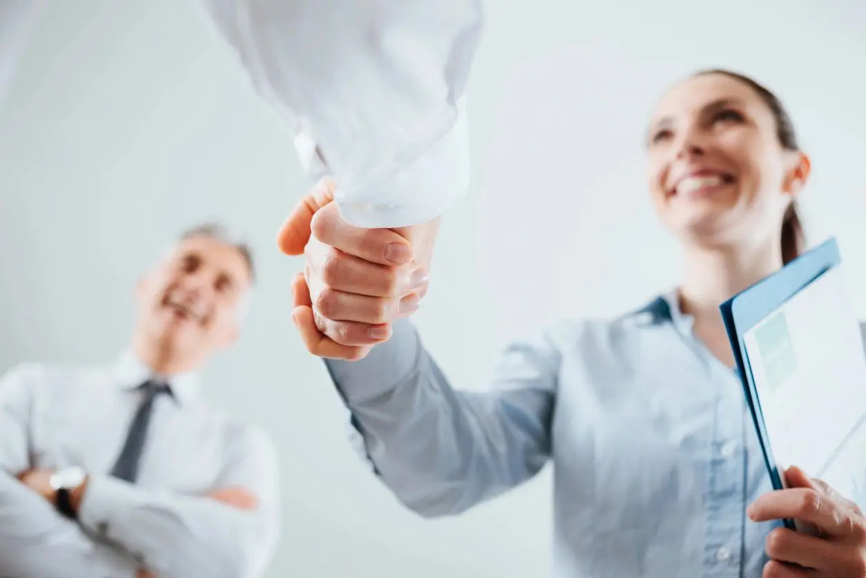 people shaking hands